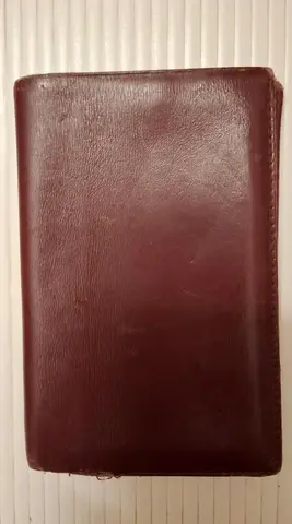 portefeuille en cuir pas neuf