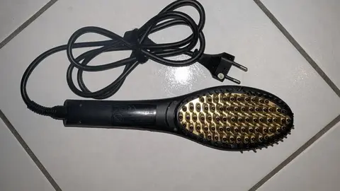 Brosse chauffante lissante