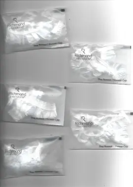 5 bonnets de douche emballés neufs