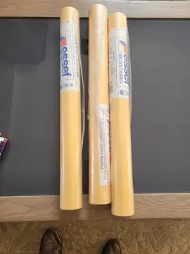 3 rouleaux de tapisserie emballés
