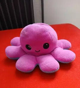 pieuvre reversible rose content ,bleu colère