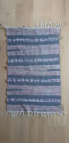 Donne tapis/descente de lit