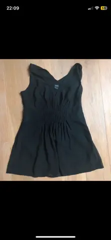 chemisier sans manches noir chic