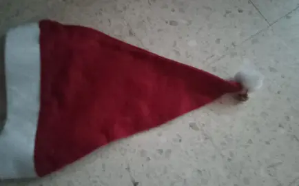 bonnet de Noël avec un grelot