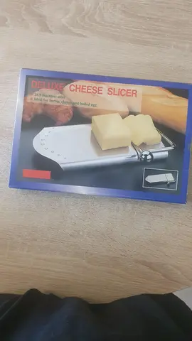 Trancheuse à fromage neuve