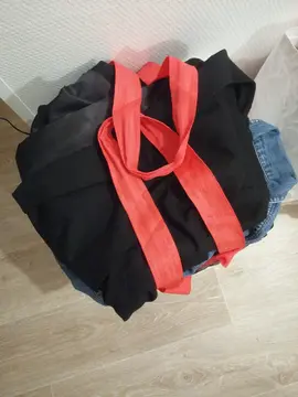 Sac d vêtements taille 36/38 très bon état