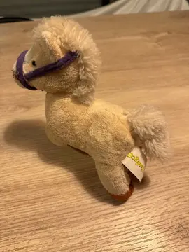 peluche cheval sonore