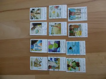 Série 12 timbres VACANCES 2019