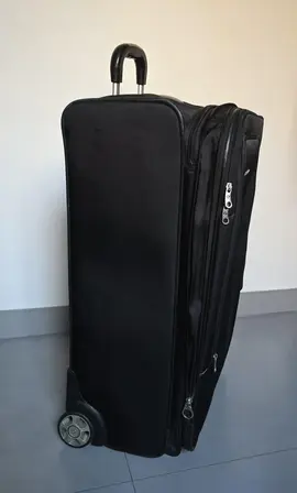 Valise Samsonite à réparer