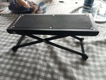 Cale pieds pour jouer de la guitare