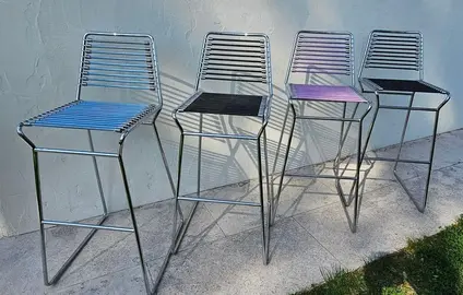4 chaises hautes/de bar chrome et sandows/tendeurs inspiration René Herbst