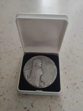 médaille dans sa boîte