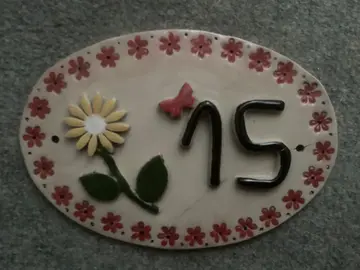 plaque numéro de rue 15 recollée