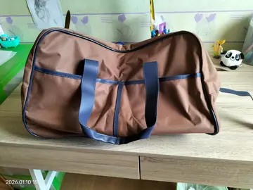 Sac de voyage neuf avec roulettes marton