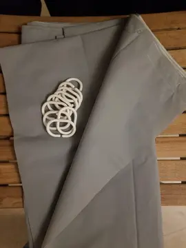 Rideau de douche et ses anneaux