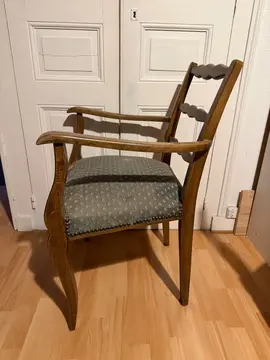 fauteuil tissus à assise ressort.