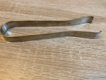 pince à sucre ou à glaçons en métal argenté