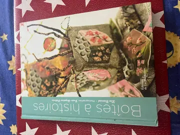 magnifique livre sur l'histoire des boîtes en travaux manuels