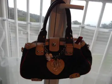 sac à main noir intérieur léopard