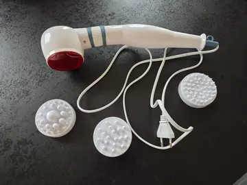 Appareil de massage avec zone chauffante