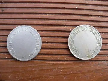 Deux jetons de taxiphone