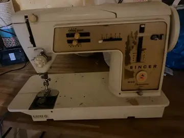 donne machine à coudre Singer