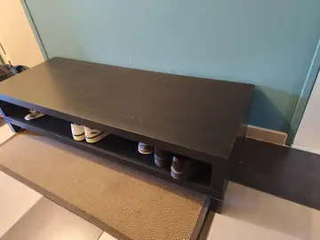 meuble télé actuellement utilisé pour ranger des chaussures