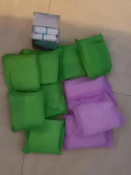 Serviettes hygiéniques et boîte tampons " Bio "