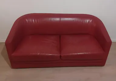 Canapé en cuir rouge convertible