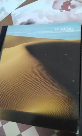 2 beaux livres sur le Sahara et La Nouvelle-Guinee ( Papouasie)