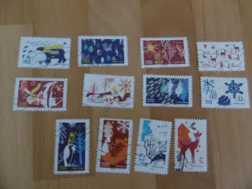Série 12 timbres Ensemble fêtons un Noël 2021