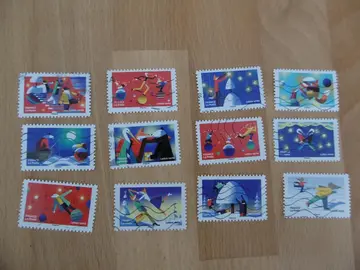 Série 12 timbres Mon carnet de timbres féérique 2022