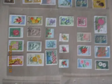24 timbres oblitérés Fleurs - divers pays