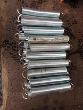 Ressorts pour porte de prairie