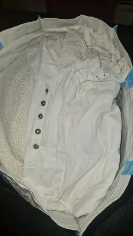 1 sac de vêtements femme