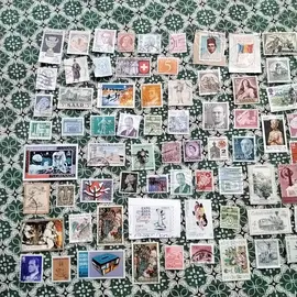 donne timbres étrangers 1lot part envoie