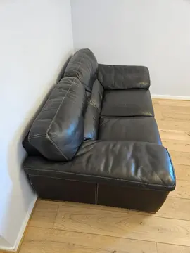 Canapé en cuir sombre Roche Bobois 2 places , bon état