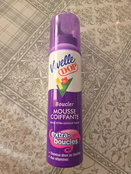 Mousse coiffante quasi neuve