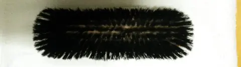 brosse à vêtements