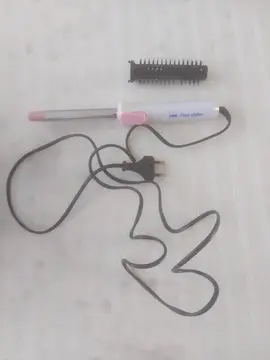 ancienne brosse pour boucles