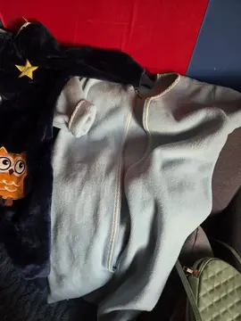 gigoteuse bébé jusqu'à 2 ans et sac de plage et serviette