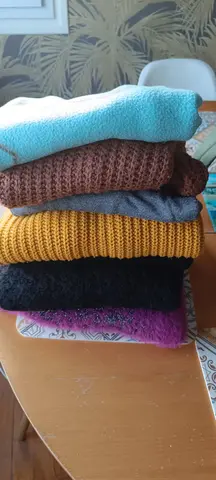 lots pulls en très bon état taille M