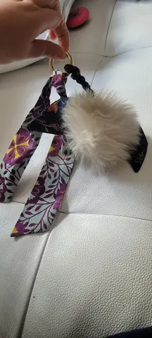 pompom à accrocher à un sac