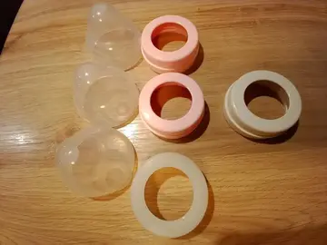 Capuchons et bagues biberons MAM