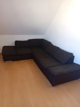 canapé d'angle noir tissu 2.60/200 état satisfaisant