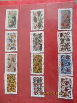 12 timbres oblitérés - série "Inspiration africaine" tissu