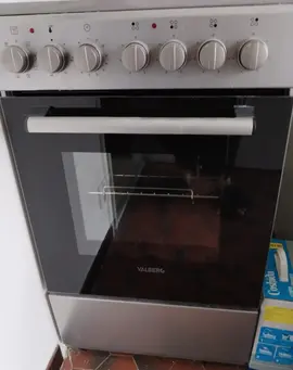 donne cuisinière servie 10 fois maximum et machine à laver