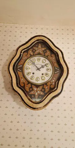 Horloge type Oeil de Boeuf