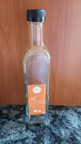 Bouteille vide en verre d'1/2 litre ayant eu du vinaigre de cidre