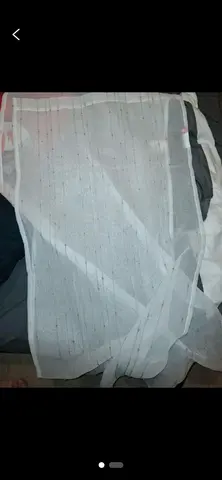 rideau et range coussin